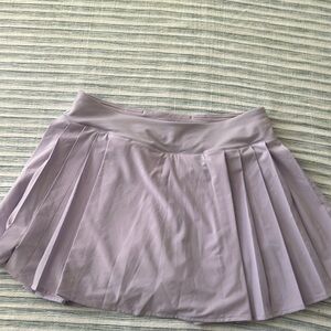 Like new-wore once - Lululemon side-pleat high rise tennis skirt.